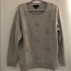 Winter Sweater Gray Winter Sweater With Jeweled Appliqus Never Worn In Fantastic Condition Elegant Silver Winter Top, Elegant Silver Tops For Winter, Batwing Cardigan, Flowy Cardigans, Olive Green Cardigan, Brown Knit Sweater, Ruffle Sleeve Sweater, Gray Winter, Purple Cardigan