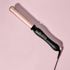 The Beachwaver B1.25 Midnight Rose is a versatile curling iron with a 1.25-inch ceramic barrel, perfect for creating loose, beachy waves or a beautiful blowout. It features 3 heat settings, a lightweight 5.5-inch barrel, simplified arrow buttons for easy rotation control, and an 8-ft swivel cord for added convenience. With its ergonomic handle and beveled, no-kink clamp, this curling iron is great for all hair types and textures, offering professional-level styling results. Key Features: • Featu Beachwaver Hair Products, Best Curler For Medium Hair, Ghd Curve Classic Wave Wand, Best Curling Wand For Fine Hair, Curling Iron Size, The Beachwaver, Loose Beachy Waves, Beach Waver, Rotating Curling Iron