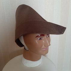 Brown Pointed Medieval Style Hat One size, would fit most Made of felt fabric Unworn handmade item To see more designs from CostumeHandmade please visit https://www.instagram.com/handmadefashionandcostume Medieval Archer, Fancy Dress Costume, Medieval Style, Medieval Fashion, Dress Costume, Fancy Dress Costumes, Felt Fabric, Robin Hood, Mens Costumes