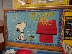 a bulletin board with a snoopy dog on it