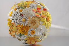 a close up of a glass ball with flowers on it