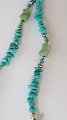 Showcasing this beautiful sterling silver  turquoise necklace in its colorful earth tones measuring approximately 35 inches in length when stretched out. Ware with casual Levi or dress up in all seasons. Condition: Excellent  Free shipping  Thanks for shopping at TheJewerlyQuest sincerely shop Turquoise Statement Necklace, Jewelry Turquoise, Gold Filled Ring, Coral Necklace, Lovely Ring, Shop Owner, Multi Strand Necklace, Blue Turquoise, Strand Necklace