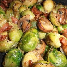 brussel sprouts with bacon and mushrooms in a skillet, ready to be cooked