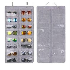 an assortment of sunglasses in a clear case with hanging hooks and eyeglasses inside