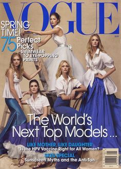 a group of beautiful women sitting next to each other on top of a magazine cover