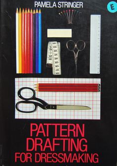 the book pattern drafting for dressmaking with scissors, rulers and pencils on it