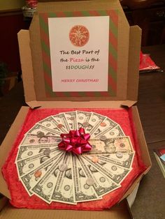 a pizza box with money in it and a red bow on the top that says, the best part of the pizza is the $ 10 dough