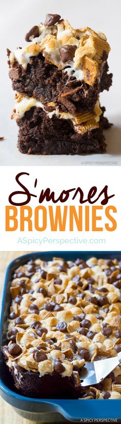 some brownies are stacked on top of each other in a blue dish and one is topped with marshmallows