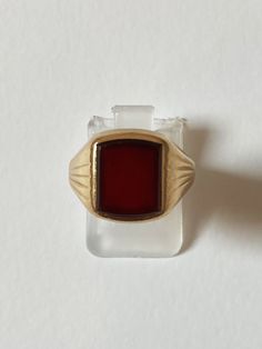 Vintage 9ct solid gold carnelian signet ring. Small signs of wear as expected from vintage pieces. weight: 4.9g ring size: UK M hallmark: 9ct gold Birmingham 1962-63 Please contact us if you have any questions Follow us on Instagram for more images and offers @lassogold Thanks for viewing Liv at Lasso x Vintage Signet Rings, Rectangle Signet Ring, Outfit Plan, Signet Rings, Small Signs, Vintage Pieces, Signet Ring, Birmingham, Solid Gold