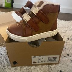 Ugg Boots For Toddlers Size 7 Never Used. New In Box, New With Tags. Brown With Shearling And Blue Bottom. Smoke Free Home. Ask For Multiple Item Purchase Shipping Discount Toddler Ugg Boots, Toddler Boots, Kids Uggs, Toddler Sizes, Ugg Shoes, Ugg Boots, Kids Shoes, Shoe Boots, Kids Shop