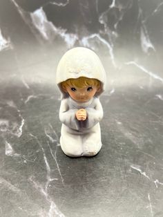 This vintage Homco figurine of a little girl praying is in excellent condition. This would make a great First Communion gift for your granddaughter or beloved niece.  Measurements are 3 1/2" tall by 1 1/2" wide. I am not an expert in vintage or antique items, but appreciate the uniqueness of each piece.  All details regarding materials, dating, and other specifics are researched to the best of my ability and knowledge, but cannot aways be verified. Vintage items have been through many hands whil Girl Praying, First Communion Gifts, Ceramic Figurine, Communion Gifts, Ceramic Figurines, First Communion, Antique Items, Vintage Ceramic, Collectible Figurines