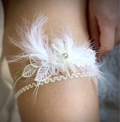 Welcome to our world of exclusive wedding garters! 🪡🪄 SET : ALESSANDRA PLEASE NOTE : THIS WEDDING GARTER IS READY TO GO WITHOUT ANY CHANGES OR AMENDMENTS  SIZE OF THIS GARTER IS 50 - 55 CM ( M/L ) , THIS GARTER ONLY BEEN USED AS A MODEL AND FOR PHOTOS  THIS GARTER IS LAST OF ITS EDITION A set of wedding garters on a flexible base with feathers, lace and beads in shades of white, champagne and beige. ABOUT US IN A FEW LINES AND PHOTOS... We are a company specializing in handcrafted sets of wedd Garter Wedding, Personalized Robe, White Champagne, Wedding Garters, Wedding Garter, Exclusive Wedding, Second Weddings, Accessories Luxury, Wedding Moments