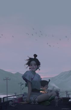 a woman sitting on top of a roof next to a child in front of mountains