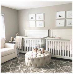 a baby's room with white furniture and pictures on the wall