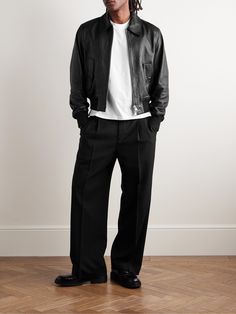 AMI PARIS' trousers are made from soft virgin wool-gabardine and tailored with double front pleats, which emphasise the contemporary wide cut. The waistband is notched for comfort and features side tabs to adjust the fit. Pleated Trousers Outfit Men, Pleated Trousers Men, Pleated Trousers Outfit, Pleated Pants Men, Trousers Outfit Men, Mens Pleated Pants, Black Fr, Formal Pants, Wide Trousers