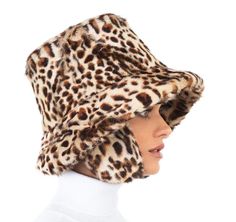 Cold weather bucket of printed goatskin was inspired by Audrey Hepburn’s 60’s chic. Cozy ear flaps can be worn secured under the chin by an adjustable Velcro tab or tucked up into the crown for a different look. Made in the USA with imported materials. Designed and Handmade in NYC Highest Quality Materials Packable Fur Accessories, Handmade Hat, Audrey Hepburn, The Crown, Hat Designs, Hair Jewelry, Hat Fashion, Cold Weather, Winter Hats