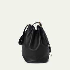 Miu Miu bucket bag in fine calf leather  Adjustable buckle shoulder strap  Drawstring closure  Approx. 11.4"H x 6.7"W x 5.1"D Made in Italy Bags For Work, Travel Size Perfume, Loafer Mules, Leather Bucket Bag, Leather Bucket, Pump Sandals, Handbags On Sale, Belt Bag, Miu Miu