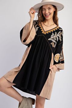 Transform your wardrobe with our Easel Embroidered Poly Linen Woven Dress. Featuring beautiful embroidery on soft, lightweight linen, this playful dress will make you stand out and feel comfortable at the same time. Perfect for any occasion, from brunch to a night out with friends! Details:- V Neck- Dropped Shoulders- 3/4 Sleeves- Embroidery Detailing- Ruching Detailing- Pockets- Loose and Relaxed Fit- Easy Pull Over Style Fabric Content:- 100% Cotton Fall V-neck Dress With Embroidered Hem, Fall Cotton Dress With Embroidered Hem, Cotton Tunic Dress With Geometric Embroidery, Casual Cotton Boho Dress With Floral Embroidery, Cotton Fall Dress With Embroidered Hem, Linen Tunic Dress With Floral Embroidery, Cotton Dress With Embroidered Hem For Fall, Casual Fall Dresses With Embroidered Hem, Embroidered Cotton Tunic Dress