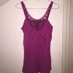 Embroidered Tank Top Embroidered neck like tank top from Charlotte Russe - brand new with tag - measures 28" from shoulder to hem - sheet front behind beading - 100% viscose - hand wash/lay flat to dry - color is a dark pink/purple Charlotte Russe Tops Tank Tops Purple Cotton Party Top, Purple Embellished Sleeveless Top, Fitted Embroidered Purple Tops, Fitted Purple Embroidered Tops, Embroidered Tank Top, Embroidered Tank, Dark Pink, Charlotte Russe, Lay Flat