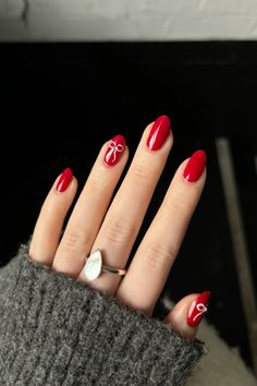 sabrina carpenter inspo. coquette nails. red nails. xmas nails. christmas nail ideas. Eras Tour Nails Red, Red Christmas Bow Nails, Red Nails Coquette, Red Nails With Bow, Red Coquette Nails, Red Bow Nails, Sabrina Carpenter Nails, Xmas Nails Christmas, Nails Xmas