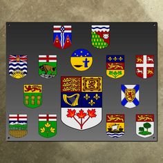 a metal sign with many different flags and emblems on it's front side