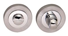 pair of chrome plated door knobs on white background