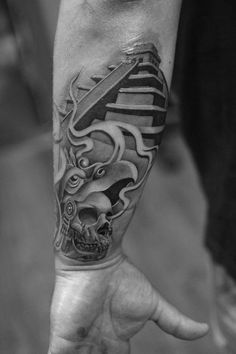 a man's arm with a tattoo on it