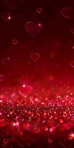 a red background with hearts and sparkles