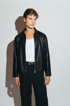 A vintage inspired vegan leather blouson. Our modern interpretation of a wardrobe classic that is both effortlessly cool & elegantly refined. Regular-fit with a slight crop to taper into the waist. Crafted from a buttery smooth, vegan leather that looks and feels like the real thing.