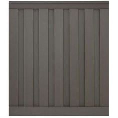 a gray fence with vertical slats on the top and bottom panel, in front of a white background