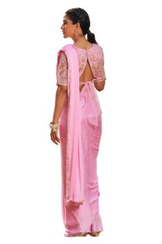 Pink pre-draped saree with an embroidered border. Paired with a padded sequin and pearl embroidered blouse. - Aza Fashions Festive Silk Pre-draped Saree, Floor-length Pre-draped Saree With Resham Embroidery, Fitted Pre-draped Saree With Dori Work, Silk Pre-draped Saree For Reception, Fitted Pre-draped Dori Work Saree, Designer Wear Pre-draped Saree With Traditional Drape, Silk Pre-draped Saree With Unstitched Blouse For Reception, Traditional Pre-draped Saree For Eid, Festive Saree With Unstitched Blouse And Side Open Design