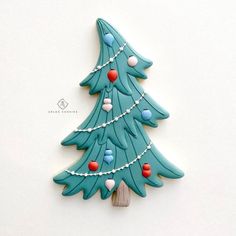 a cookie decorated like a christmas tree