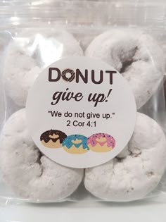 doughnuts in a plastic bag with donut give up sticker