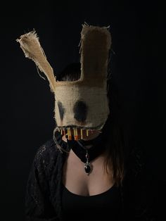 Experience the Ancient Power of Masks with something Dark and Beautifully Creepy. These Scary Rabbit masks are made using thick eco-felt, then covered in stained and hand-painted fabric grade burlap. These custom masks are perfect for Halloween Costumes, Photo and Video Shoots, and scaring the living daylights out of people. * Lightweight - eco-felt and burlap * Adjustable - cotton twill tape ties in the back * Comfortable - lined with soft eco-felt * Made in a smoke free studio * Free Shipping Rabbit Mask Halloween, Teeth Mask Halloween, Full Face Rabbit Mask, Bunny Mask Halloween Costume, Scary Bat Mask, Spooky Doll Mask, Rabbit Mask Creepy, Creepy Easter Bunny, Easter Bunny Mask