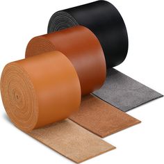 three rolls of rubber flooring on top of each other with different colors and sizes