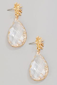 Large faceted tear rhinestone dangle earrings. This pair of dangle earrings brings a stunning large faceted tear rhinestone style. Unveil a new dimension of sophistication as this accessory effortlessly enhances the elegance of your ensemble. Made in: Imported Glamorous Crystal Teardrop Earrings, Elegant Teardrop Clear Earrings, Elegant Clear Drop Crystal Earrings, Elegant Clear Teardrop Earrings, Party Pearl Drop Crystal Earrings, Elegant Faceted Teardrop Earrings, Elegant Clear Teardrop Crystal Earrings, Elegant Jeweled Teardrop Dangle Earrings, Glamorous Drop Crystal Earrings For Pierced Ears