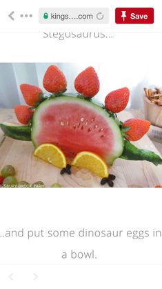 a watermelon sculpture made to look like an animal with fruit on its head