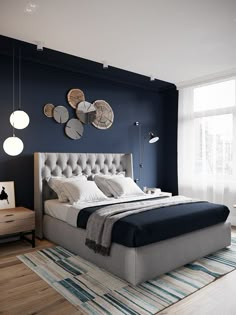 a bedroom with blue walls, white bedding and wooden floors is pictured in this image