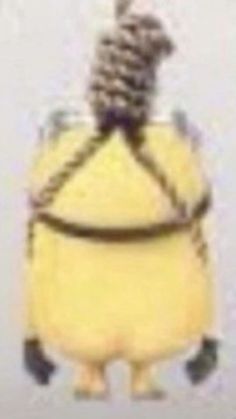 an image of a yellow object with a rope on it's back and legs