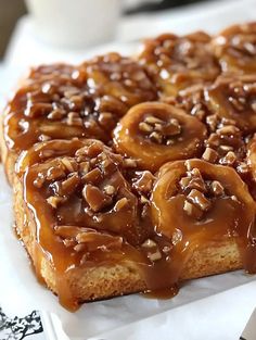 a close up of a pastry with caramel on it