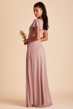 Let's be honest, not every bridesmaid will want their shoulders and arms fully exposed—but sleeves are not always the most comfortable. We wanted to design a dress that gives you some romantic flair without having to fuss and fidget with your sleeves all night. Enter the Hanna flutter sleeve bridesmaid dress. As the name suggests, the sleeves offer just enough to be sweet, and they drape beautifully over the shoulders so you can have full control of your arm movements for all those bridesmaid du Early Pregnancy Dresses, Maternity Gowns Formal, Mulberry Bridesmaid Dresses, Rose Bridesmaid Dress, Mauve Bridesmaid, Mauve Bridesmaid Dress, Ruffles Bridesmaid Dresses, Bridesmaid Dress Chiffon, Convertible Bridesmaid Dress