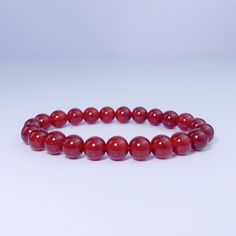 Authentic | High Grade | USA | 3 Days Free Shipping | ASANA Red carnelian bracelet This red carnelian bracelet is a beautiful and unique piece of jewelry. It is made of red carnelian gemstones, which are known for their vibrant color. This bracelet would make a great gift for someone who loves unique and eye-catching jewelry. * 100% Authentic Gemstones * Ethically Sourced * Asana Crystals (USA Brand) * By Women for Women * 8MM - Perfect casual size * 30 Days Easy Return Carnelian Metaphysical Me Carnelian Bracelet, Red Carnelian, Carnelian Crystal, Orange Stone, Healing Crystal Jewelry, Carnelian Beads, Healing Jewelry, Stay Positive, Red Stone