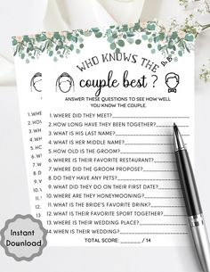 a couple's wedding game with flowers and a pen