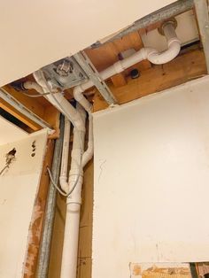 the pipes are connected to the ceiling in this room that is being remodeled and remodeled