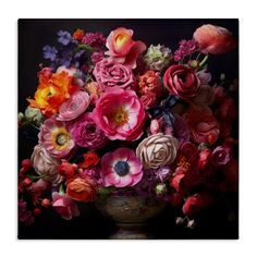 a vase filled with lots of colorful flowers