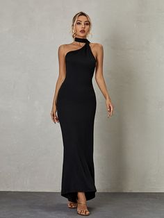 Toula Backless Maxi Dress In Black offers the perfect combination of coverage and elegance. The floor-skimming silhouette features a backless design with a ruched detail that creates an alluring yet modest look. The lightweight fabric will keep you feeling cool and comfortable throughout the day.    Material: 83% Polyester, 17% Spandex   Stretch Factor:  High  Stretch   Clean: Gentle machine wash    Color may vary due to the lighting on images. The product images (without model) are the closest Backless Maxi Dress, Shapewear Tops, Jumpsuits And Romper, Backless Design, Backless Maxi Dresses, Feather Dress, Maxi Dress Green, Embellished Dress, Prom Party Dresses