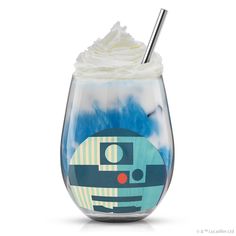 a glass filled with whipped cream and a star wars character on it