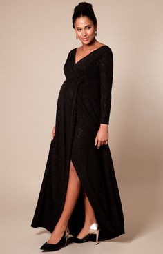 Make an entrance with our Isabella Maternity Gown in dramatic Glitter Black, a must-have for black-tie events and formal weddings. Designed with a flattering crossover neckline and full-length sleeves, the sultry wrap skirt drapes beautifully over your bump and splits to the knee allowing you to show off a little skin. Glamorous yet blissfully comfortable in a luxurious stretch fabric, the subtle glitter detail will shine with you all evening. Black formal maternity gown Glitter detail Faux-wrap Maternity Gowns Formal, Rose Tiffany, Dress For Pregnant, Neck Bracelet, Tiffany Rose, Glittery Dress, Maternity Bridesmaid Dresses, Skirt Draping, Cape Gown