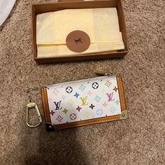 Louis Vuitton White And Rainbow Vintage Wallet/Keychain Bought Off The Real Real The Real Real, Wallet Keychain, Louis Vuitton White, Vintage Wallet, Rainbow Vintage, Bags Louis Vuitton, Real Real, Keychain Wallet, Louis Vuitton Bags