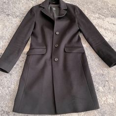 This Is A Fabulous Cinzia Roca Pea Coat! Perfect For Work Or A Nice Night Out. It Hits Right Above The Knee And Looks Great With Dresses / Skirts And Jeans Alike! Made In Italy Of Pure Virgin Wool. I Bought This In 2019 Right Before My Trip To Paris. I Am Not 100% Sure Of The Size But I Am A 4 / 6 (5’6 And 135 Pounds) And It Fits Like A Glove. Happy To Send More Pictures Or Answer Any Further Questions! Designer Long Sleeve Wool Coat For Office, Designer Long Coat For Semi-formal Occasions, Designer Black Long Sleeve Wool Coat, Designer Long Pea Coat For Work, 135 Pounds, Nice Night, Trip To Paris, My Trip, Pea Coat